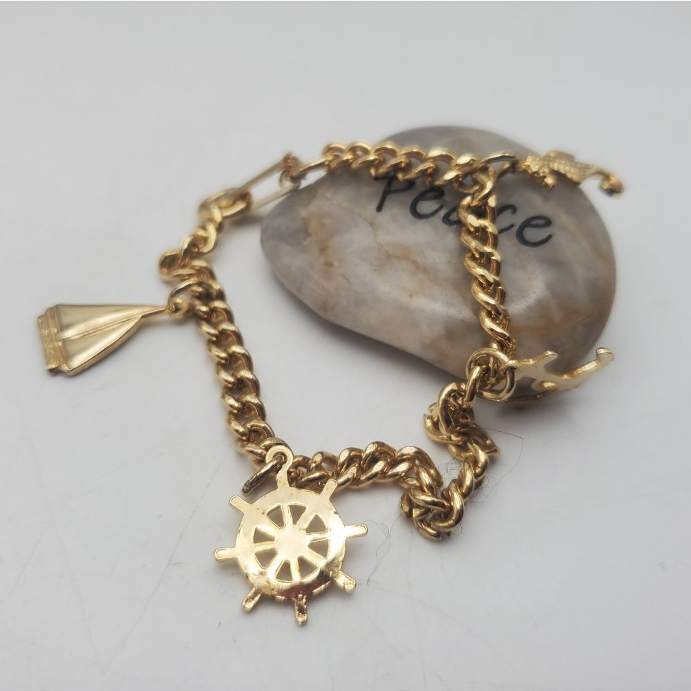 Gold toned sailor‎ charm bracelet B0719